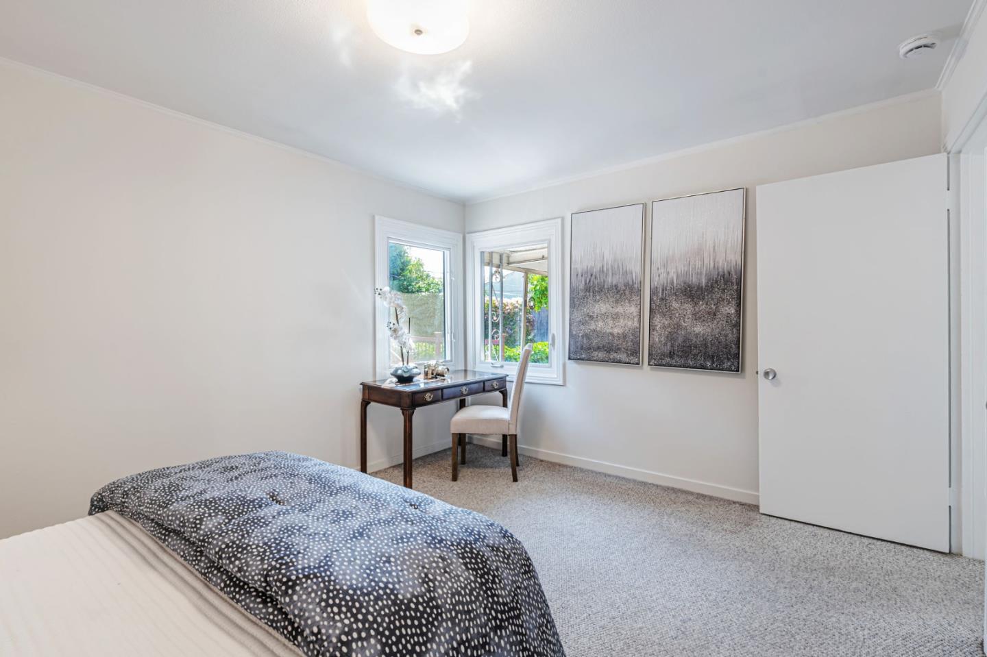 3993 Pasadena Drive San Mateo, CA 94403 - Photo 28 of 40 a living room with a couch and a table