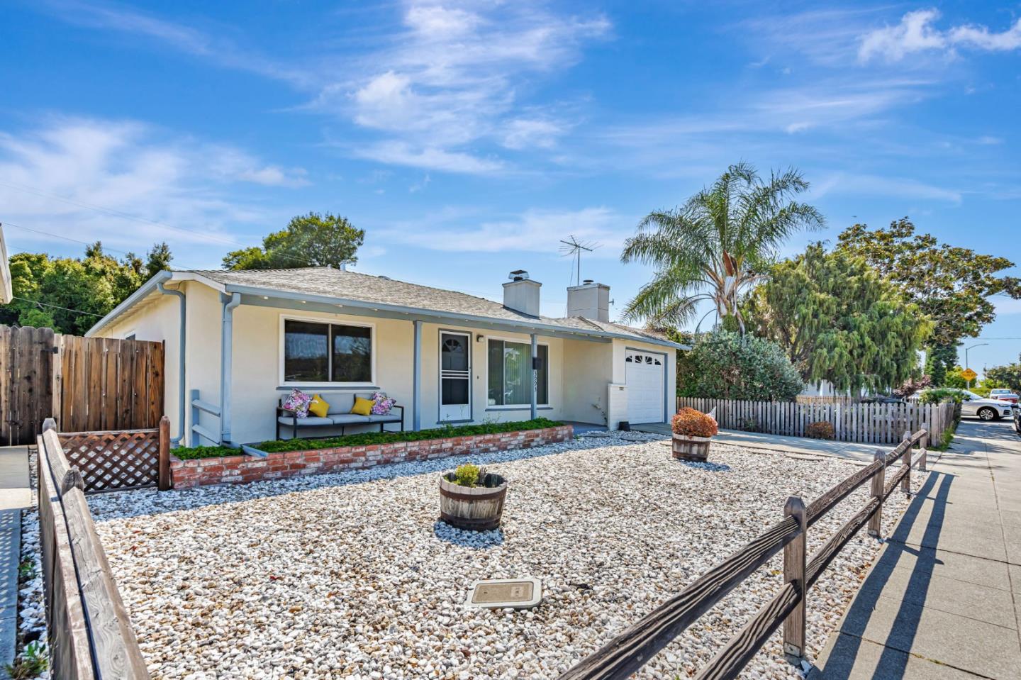 3993 Pasadena Drive San Mateo, CA 94403 - Photo 3 of 40 a front view of house with yard nad seating space