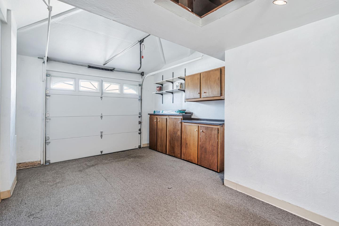 3993 Pasadena Drive San Mateo, CA 94403 - Photo 34 of 40 a view of a garage