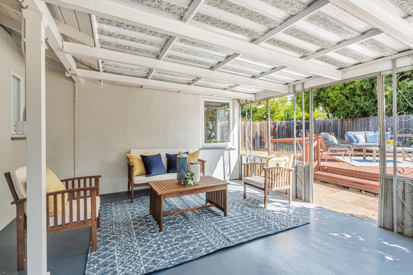 3993 Pasadena Drive San Mateo, CA 94403 - Photo 35 of 40 a outdoor living space with furniture and a garden view