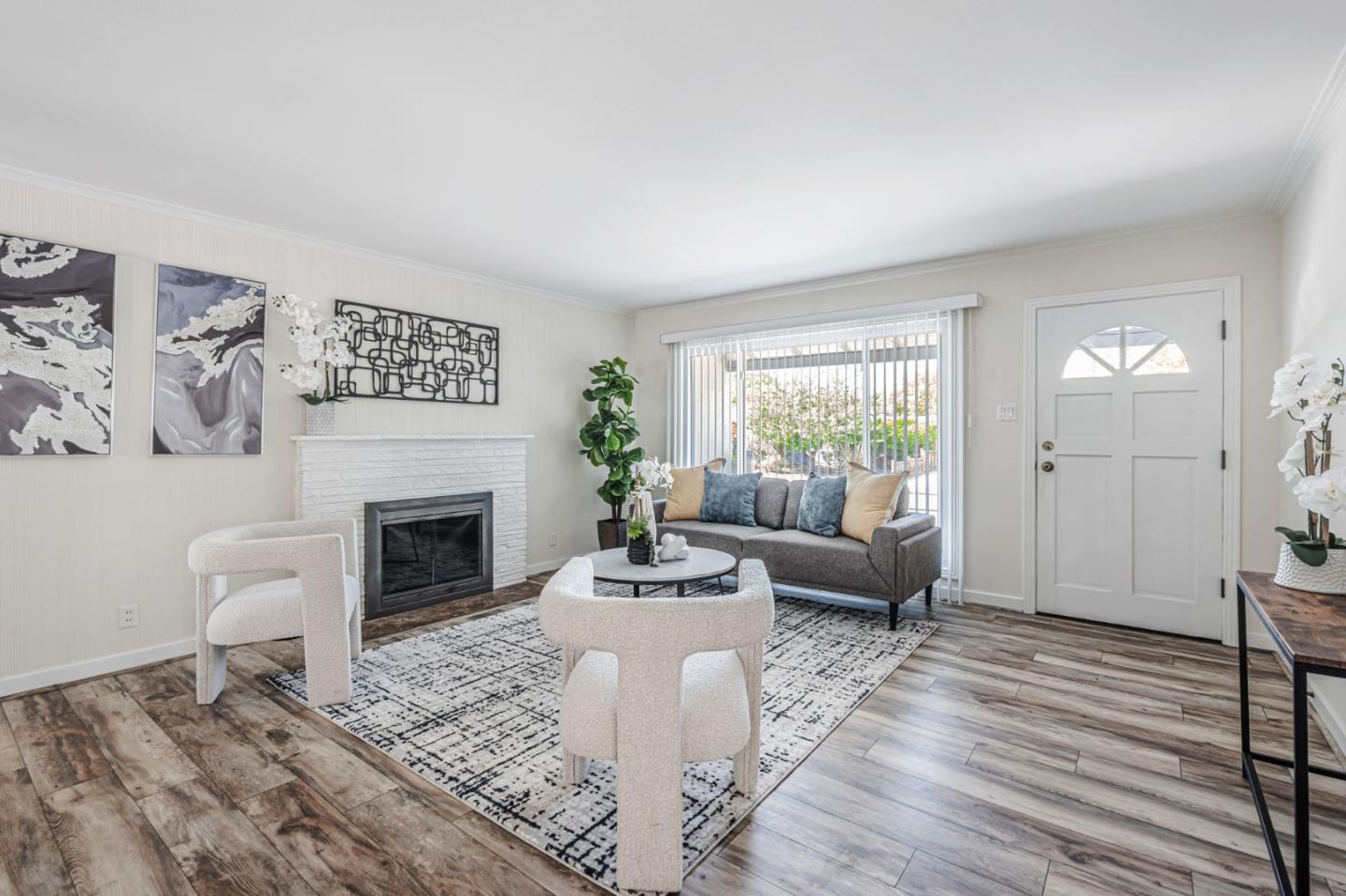 3993 Pasadena Drive San Mateo, CA 94403 - Photo 6 of 40 a living room with furniture and a fireplace