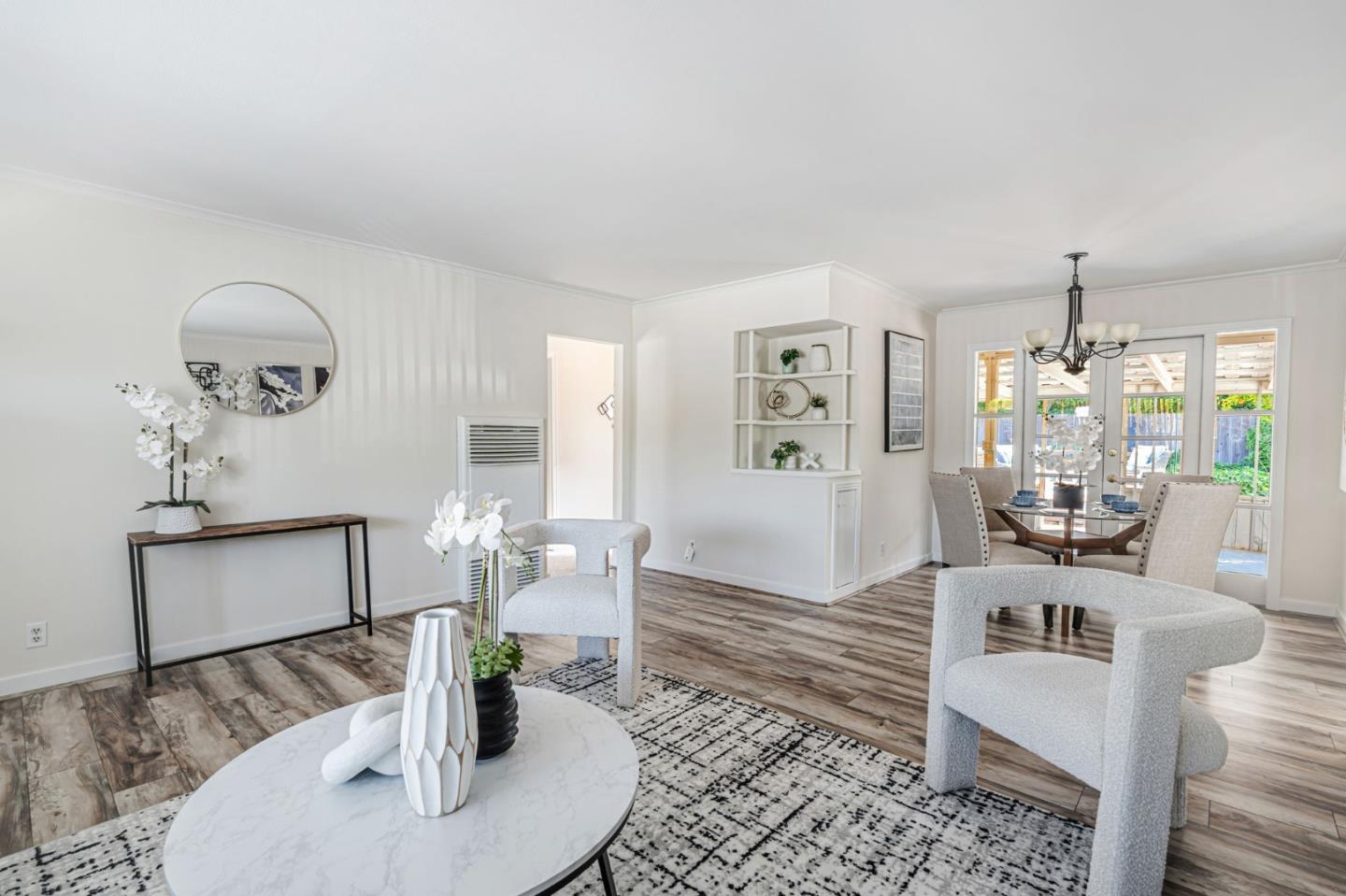 3993 Pasadena Drive San Mateo, CA 94403 - Photo 9 of 40 a living room with furniture and a table