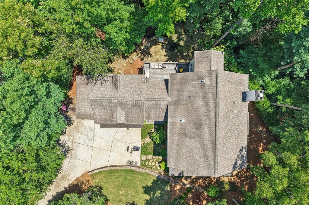 3910 Two Rivers Drive Cumming, GA 30041 - Photo 97 of 110 an aerial view of a house with a yard