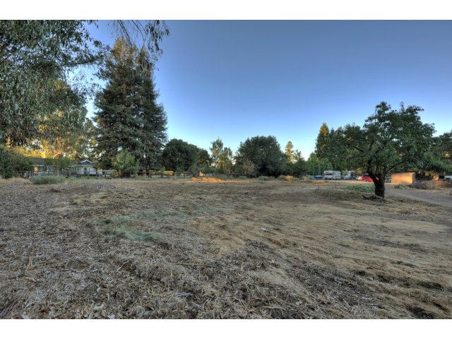 12943 Pierce Road Saratoga, CA 95070 - Photo 1 of 6 a view of a field with trees in background
