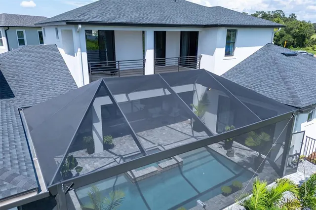 a backyard of a house with lots of green space