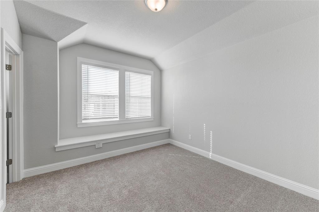 2605 Sam Bass Road, Unit 91 Round Rock, TX 78681 - Photo 14 of 32 an empty room with a window