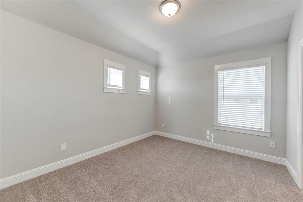 2605 Sam Bass Road, Unit 91 Round Rock, TX 78681 - Photo 17 of 32 an empty room with a window