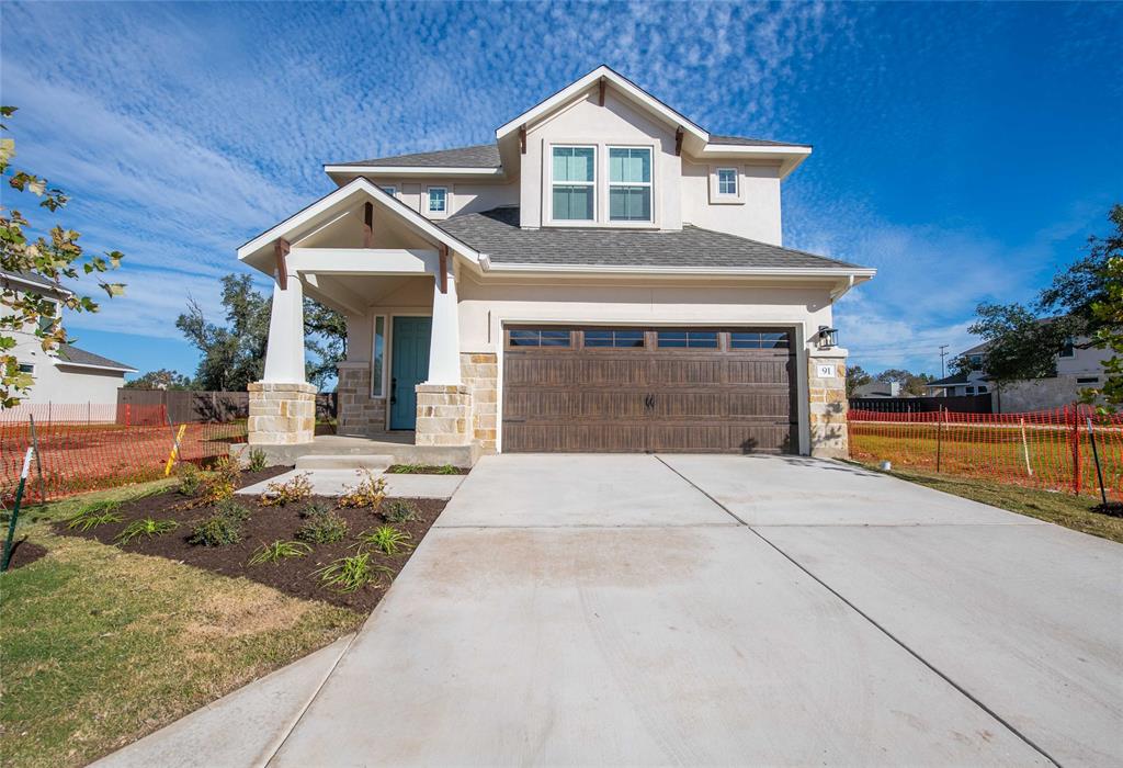 2605 Sam Bass Road, Unit 91 Round Rock, TX 78681 - Photo 3 of 32 a front view of a house with yard