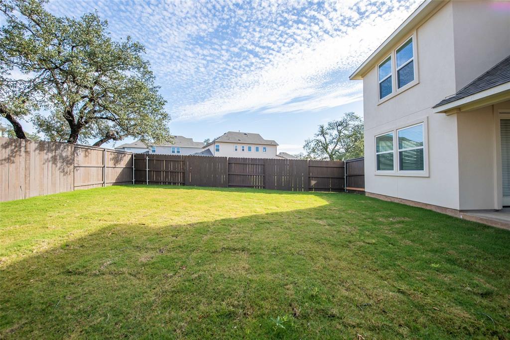 2605 Sam Bass Road, Unit 91 Round Rock, TX 78681 - Photo 31 of 32 a swimming pool with outdoor seating and yard