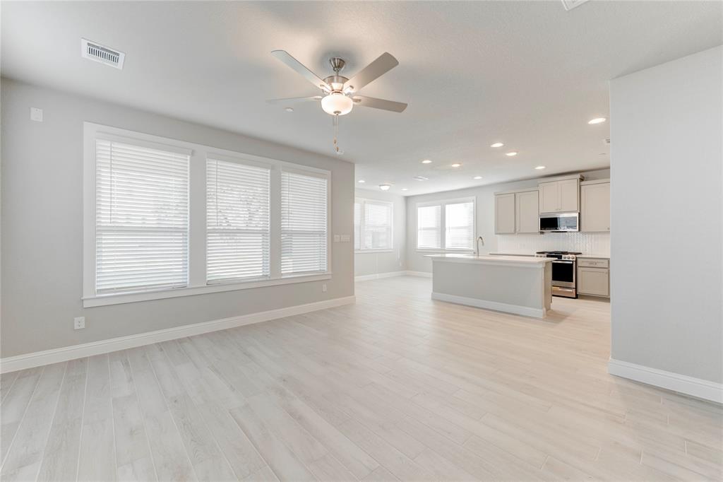 2605 Sam Bass Road, Unit 91 Round Rock, TX 78681 - Photo 5 of 32 a view of an empty room with a window