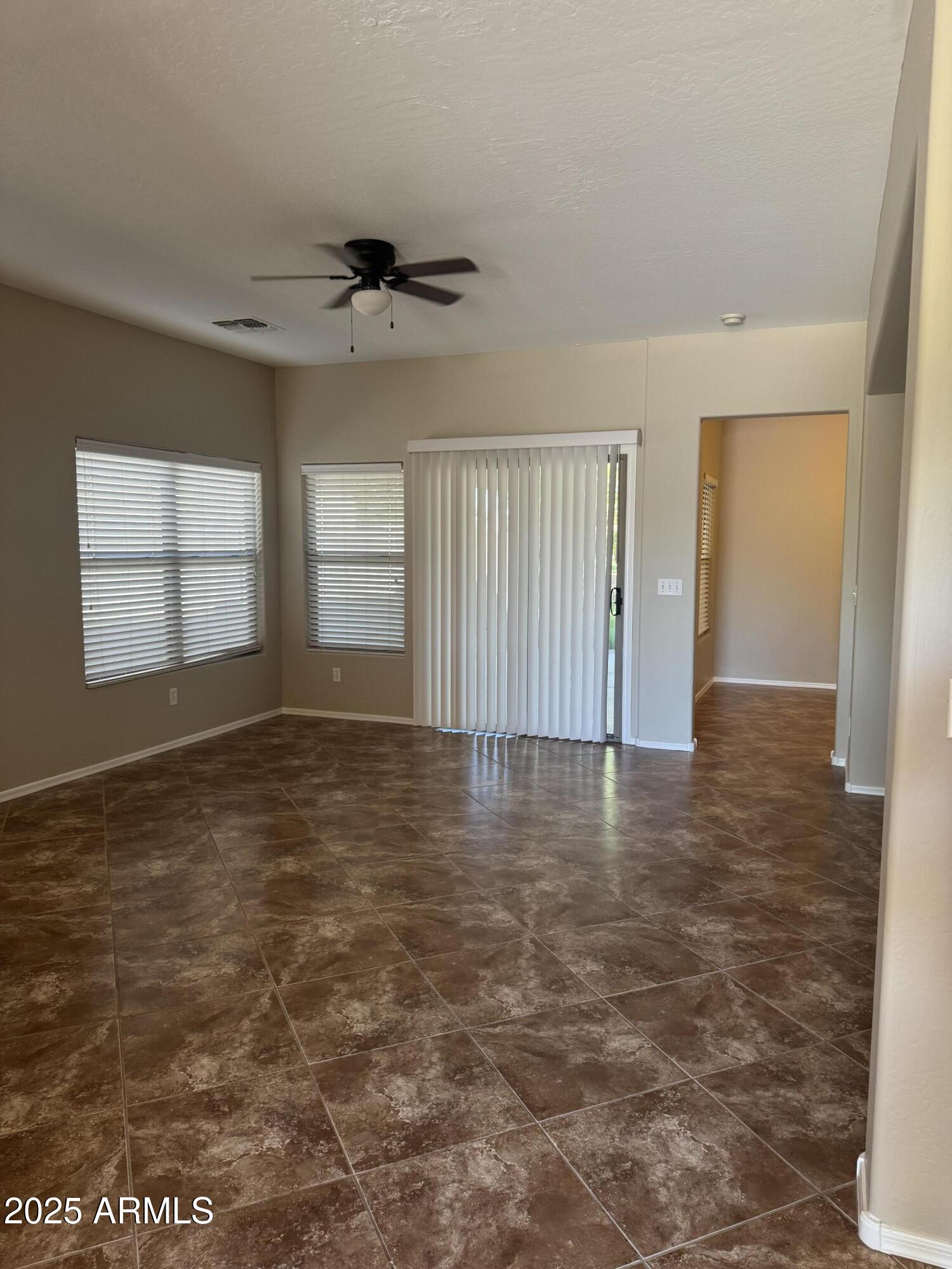 3600 East Denim Trail San Tan Valley, AZ 85143 - Photo 21 of 50 an empty room with windows and closet