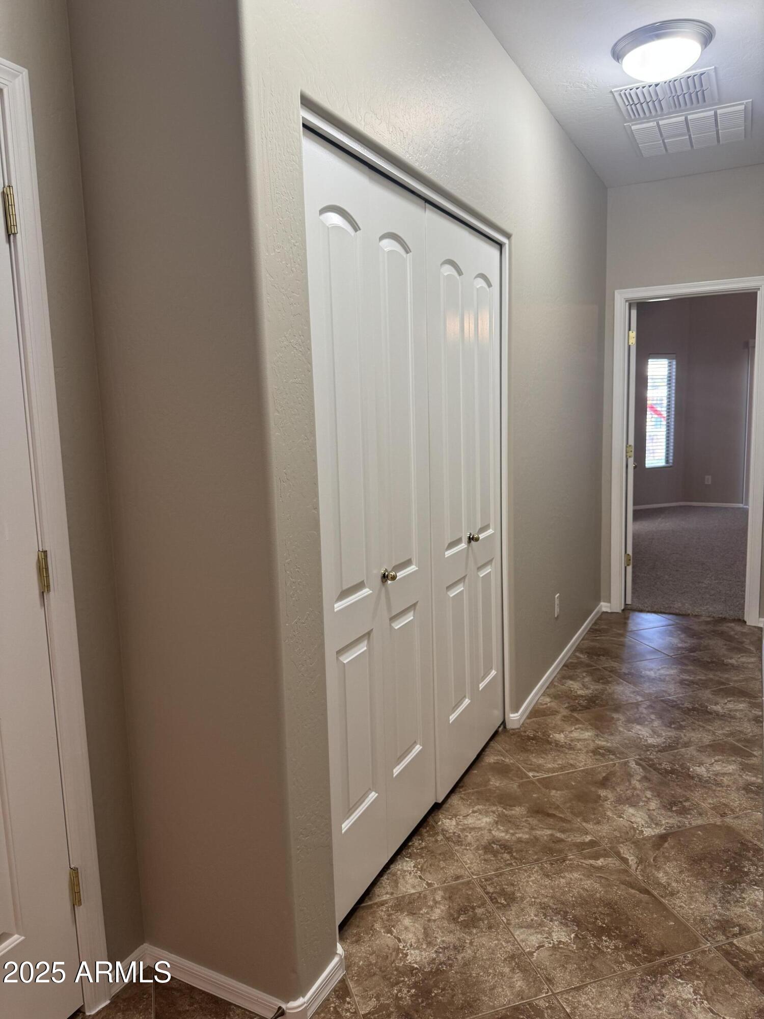 3600 East Denim Trail San Tan Valley, AZ 85143 - Photo 30 of 50 a view of a hallway with wooden floor