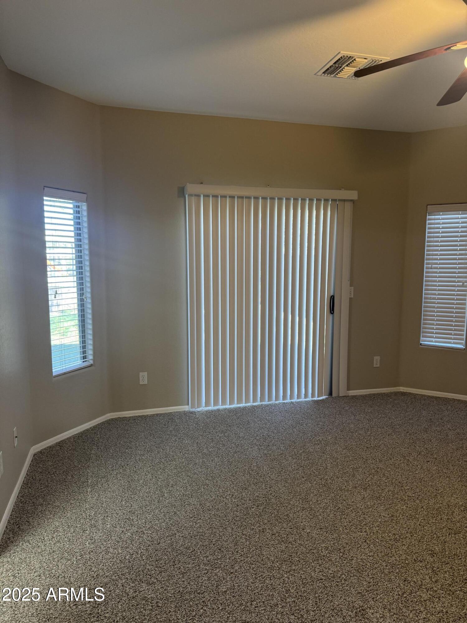 3600 East Denim Trail San Tan Valley, AZ 85143 - Photo 39 of 50 a view of an empty room with a window