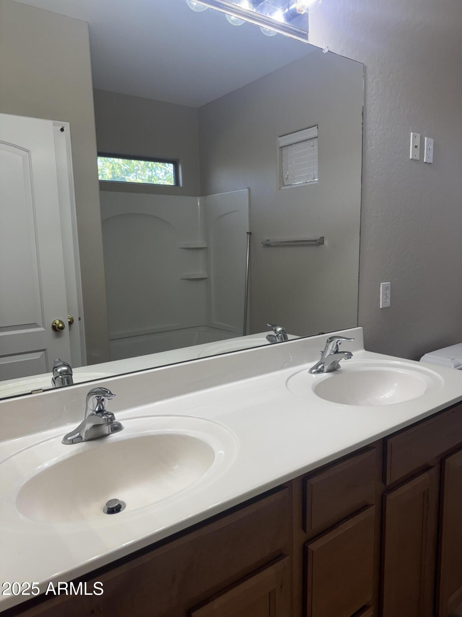 3600 East Denim Trail San Tan Valley, AZ 85143 - Photo 42 of 50 a bathroom with a sink and a mirror