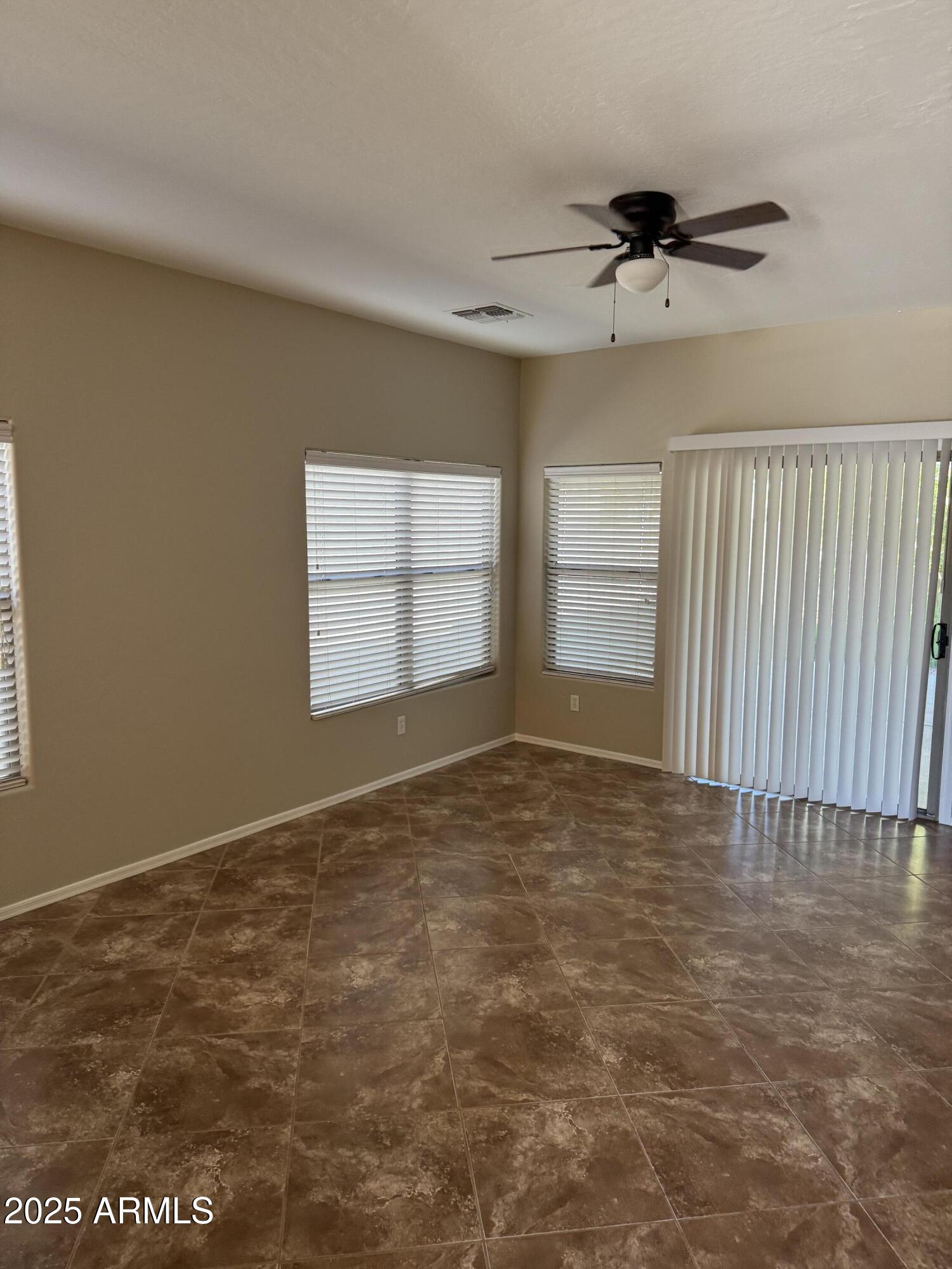 3600 East Denim Trail San Tan Valley, AZ 85143 - Photo 47 of 50 a view of an empty room with a window