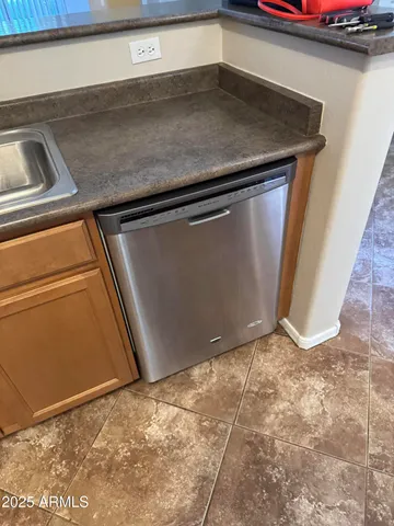 a kitchen with a stove and a microwave