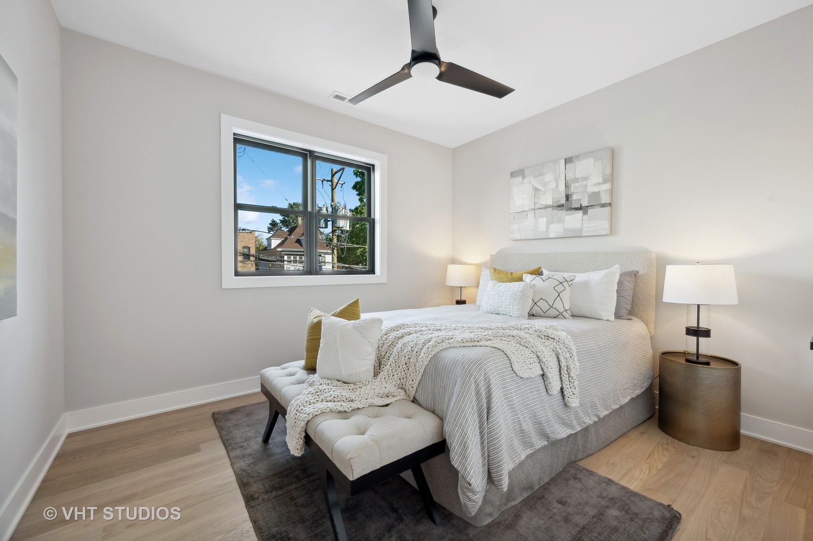 4537 North Clark Street, Unit 2D Chicago, IL 60640 - Photo 21 of 27 a bedroom with a bed and a painting on the wall