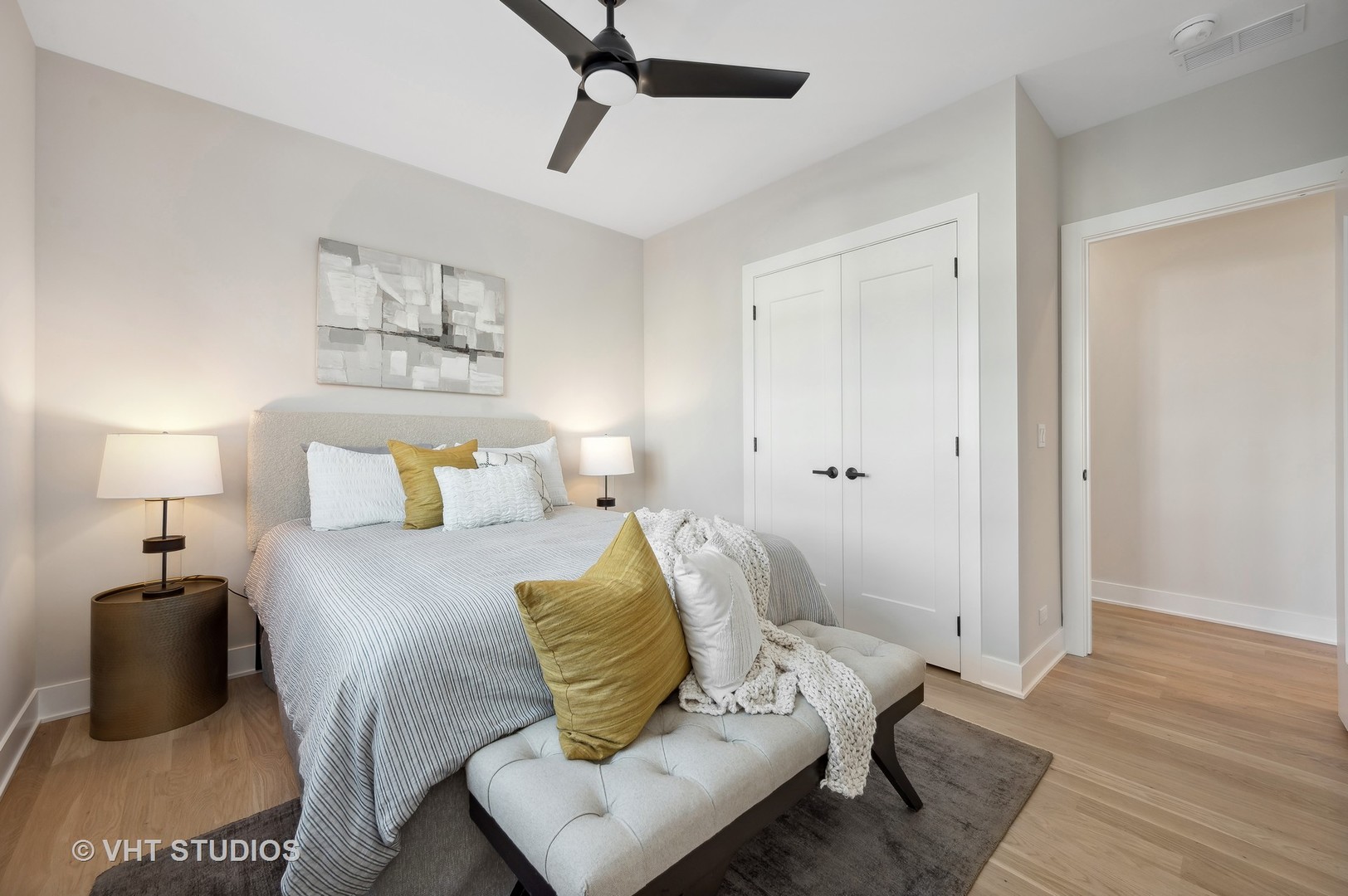 4537 North Clark Street, Unit 2D Chicago, IL 60640 - Photo 22 of 27 a bedroom with a bed and wooden floor