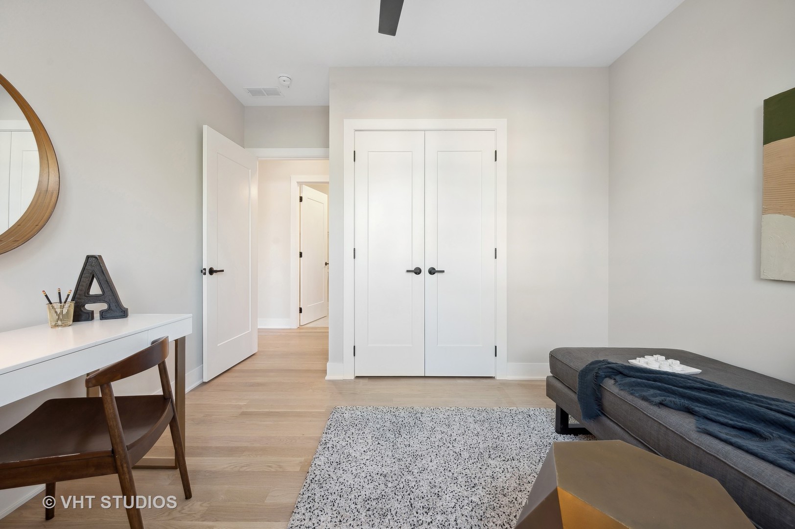 4537 North Clark Street, Unit 2D Chicago, IL 60640 - Photo 24 of 27 a bedroom with a bed and a table in it