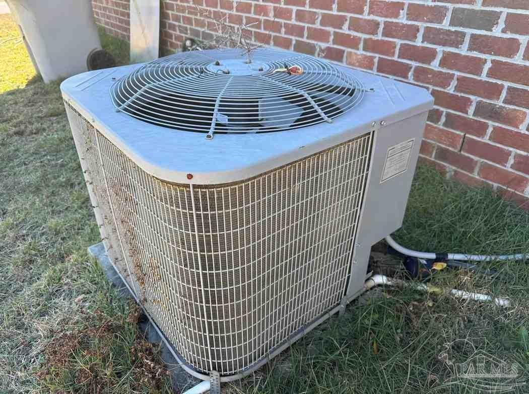 8826 Bluebell Street Milton, FL 32583 - Photo 7 of 25 a view of staircase with wooden floor