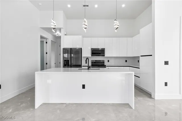 $395,000 | 1904 Crawford Avenue North, Lehigh Acres, FL 33971