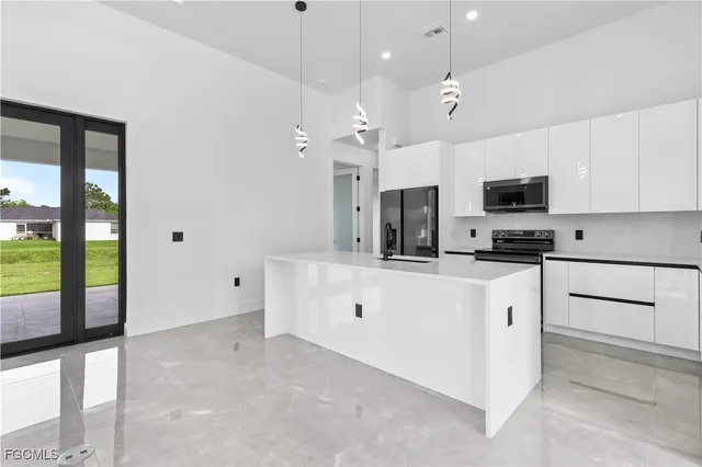 $395,000 | 1904 Crawford Avenue North, Lehigh Acres, FL 33971