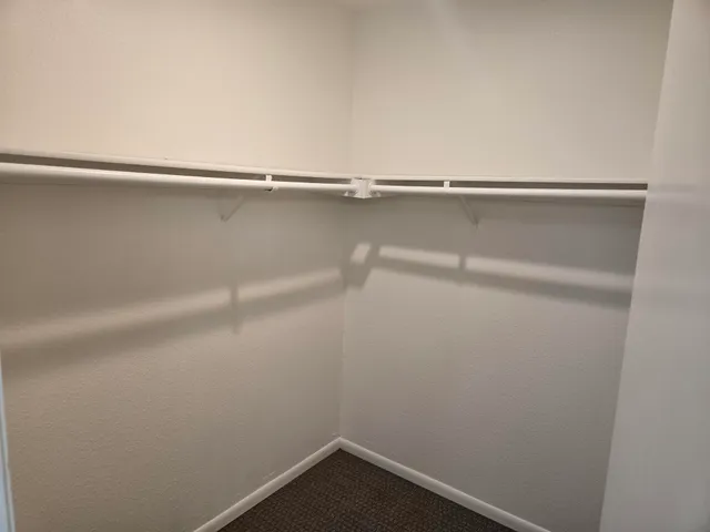 a view of small space with racks on the wall