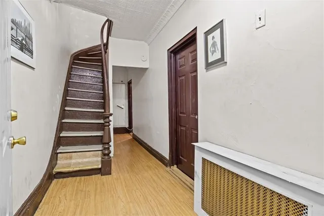 a bathroom with a bathtub shower sink and toilet