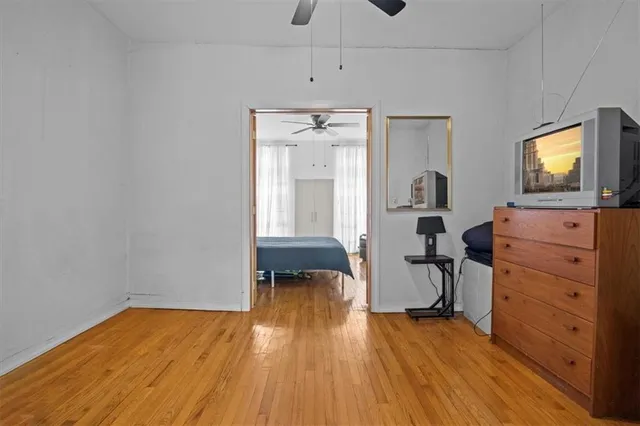 a bedroom with a bed and furniture