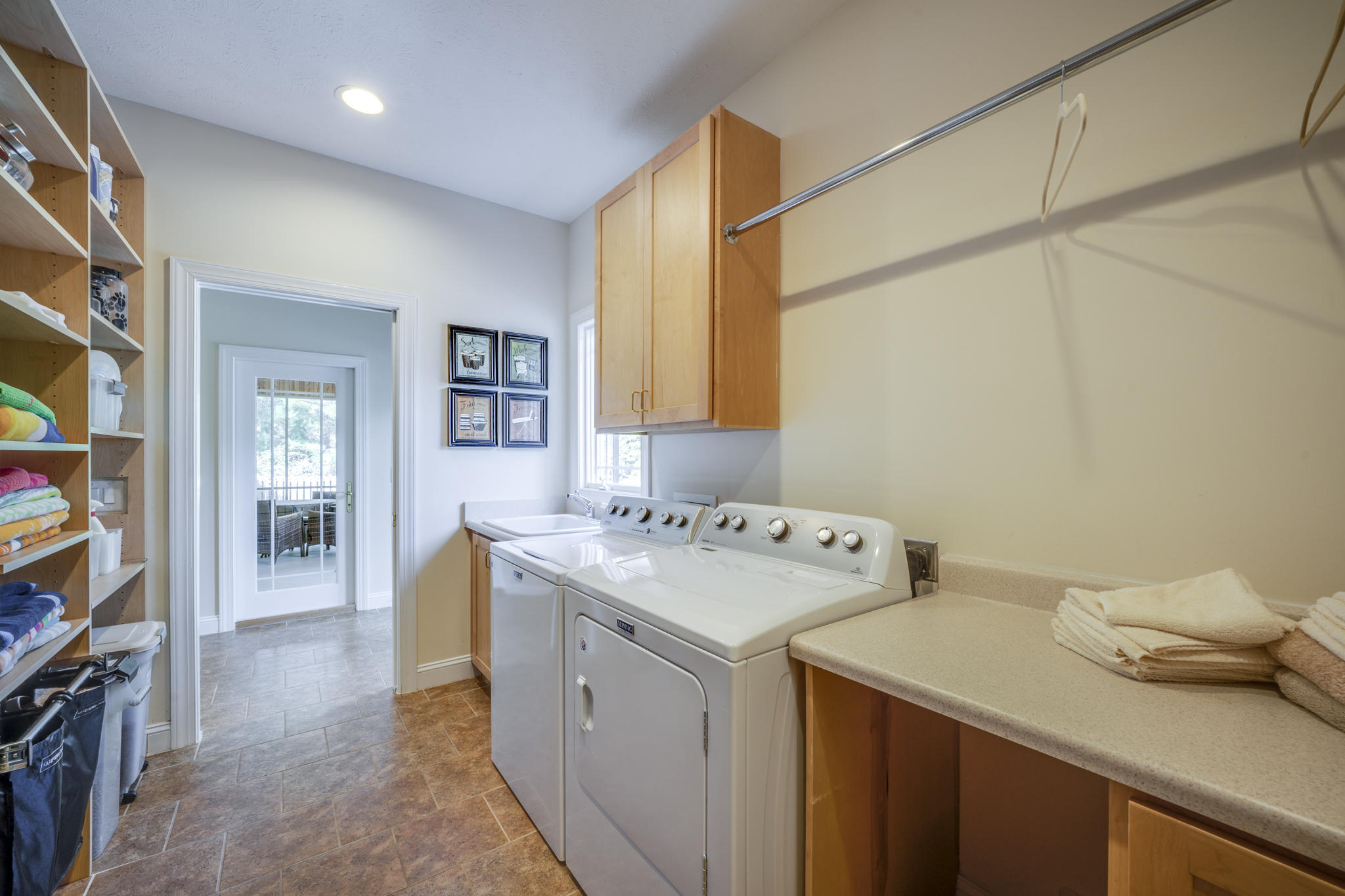 560 Grove Road Southern Pines, NC 28387 - Photo 27 of 52 Laundry Room with Hanging Rack