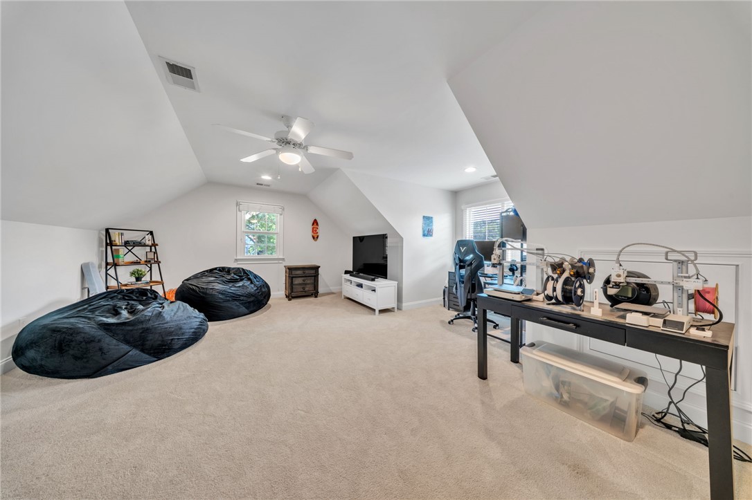 102 Country Walk Lane Clemson, SC 29631 - Photo 22 of 39 A versatile bonus room awaits, perfect for a home office, media area, or relaxation space.