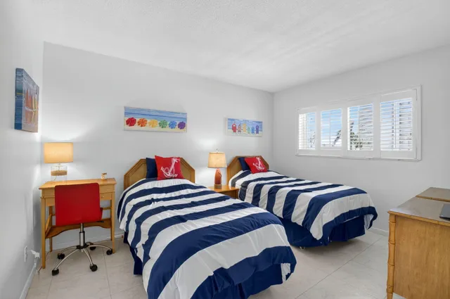 a view of a balcony with furniture