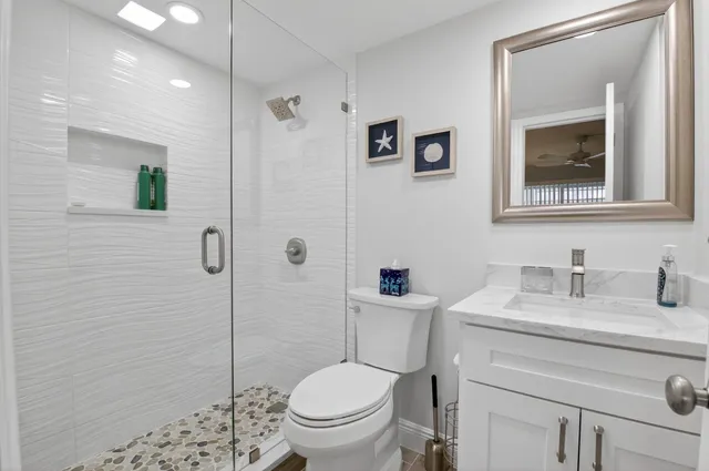 a view of a balcony with a table and chairs