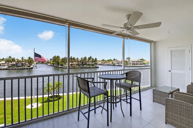 a view of a swimming pool with a lounge chairs