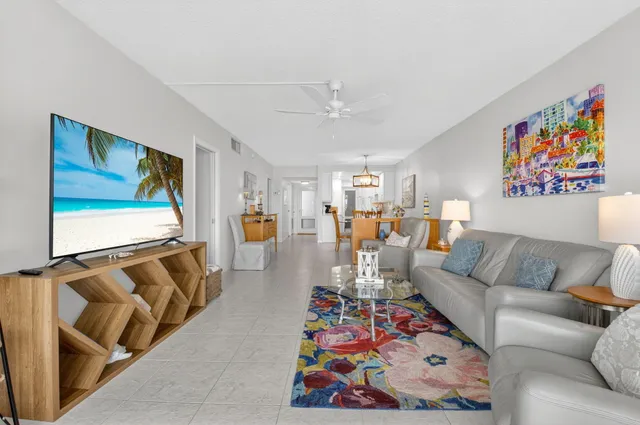 a kitchen with cabinets appliances and a counter top space