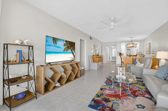 a kitchen with cabinets and white appliances