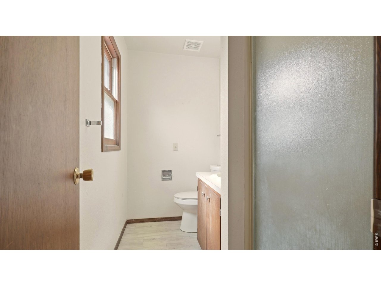 914 Prospect Street Fort Morgan, CO 80701 - Photo 13 of 17 a bathroom with a sink and a toilet