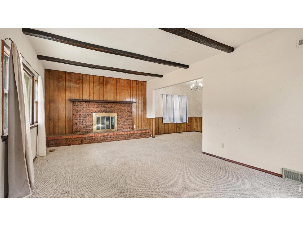 914 Prospect Street Fort Morgan, CO 80701 - Photo 3 of 17 a open hall with a fireplace