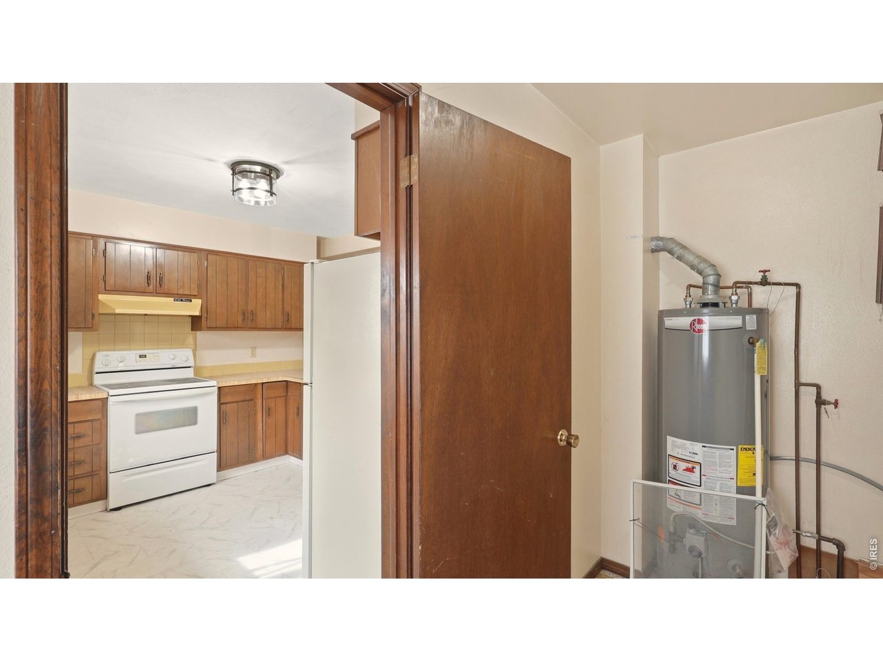 914 Prospect Street Fort Morgan, CO 80701 - Photo 7 of 17 a bathroom with a sink and a mirror