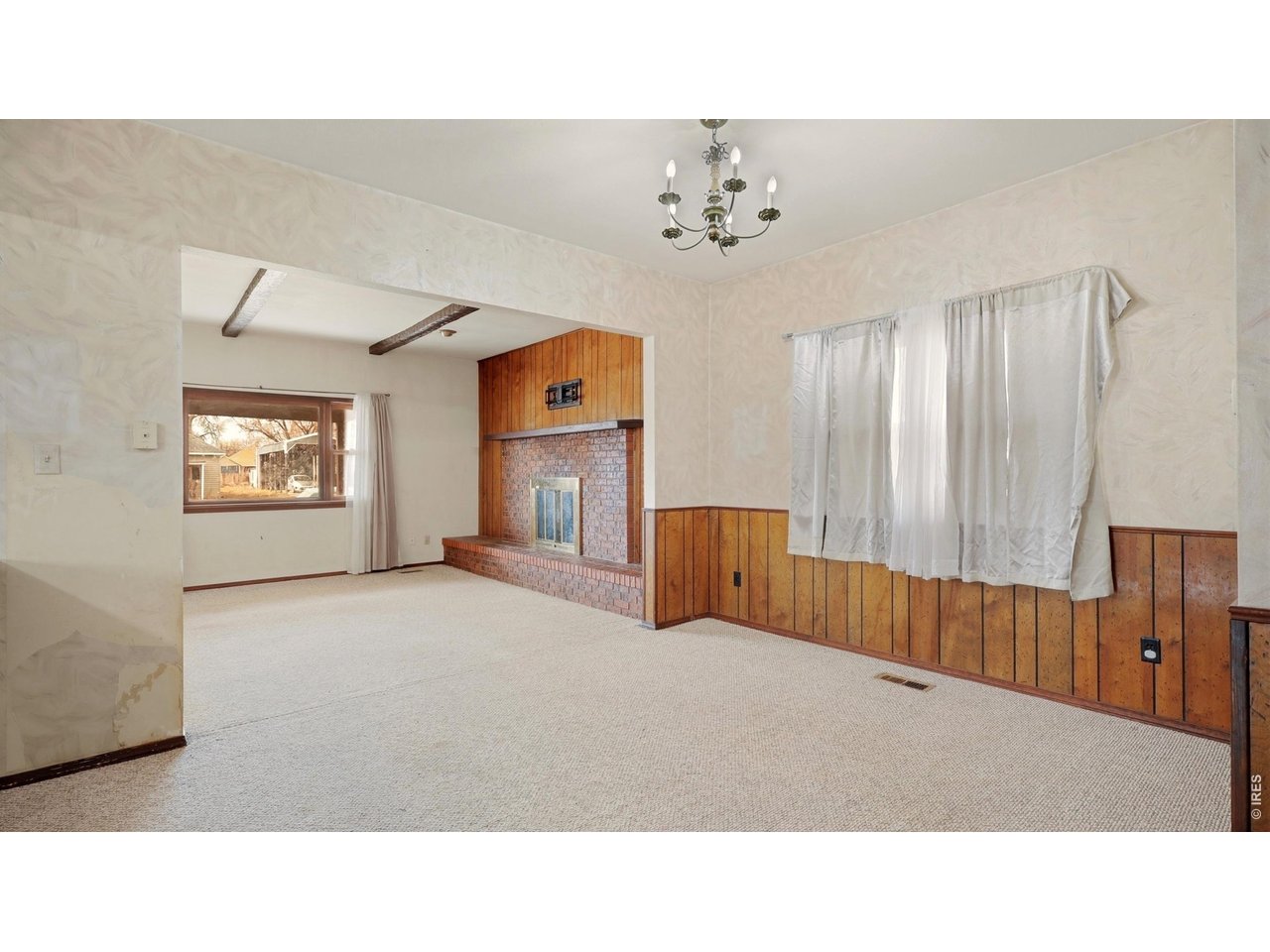 914 Prospect Street Fort Morgan, CO 80701 - Photo 9 of 17 a living room with furniture and a window