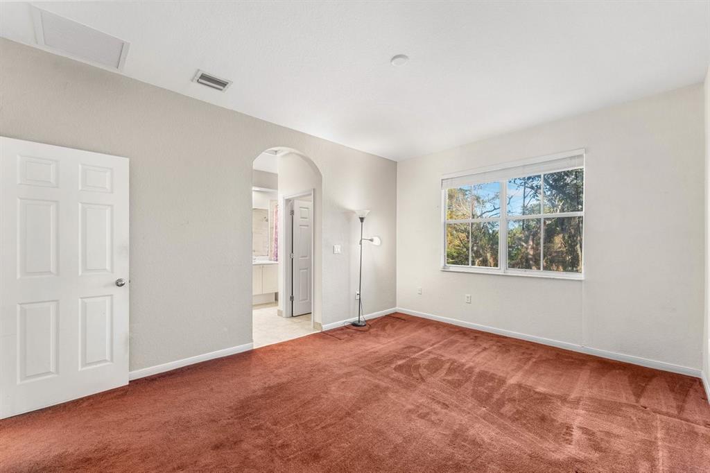 3307 Merrick Lane, Unit 1004 Margate, FL 33063 - Photo 19 of 30 a view of an empty room with a window