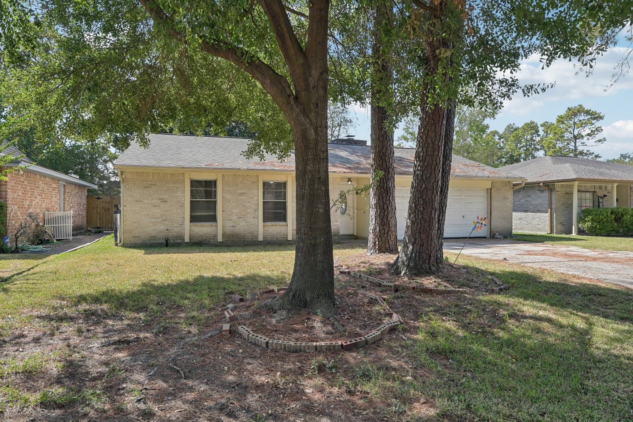 4310 Towergate Drive Spring, TX 77373 - Photo 2 of 46 a view of a house with backyard and a tree