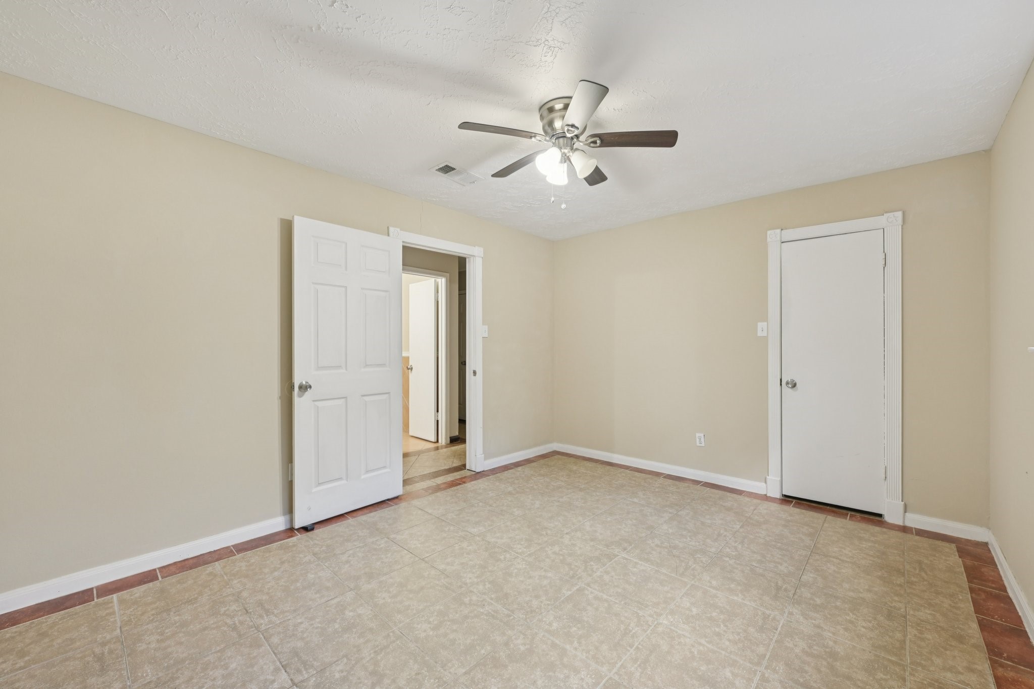 4310 Towergate Drive Spring, TX 77373 - Photo 21 of 46 a view of an empty room and chandelier fan