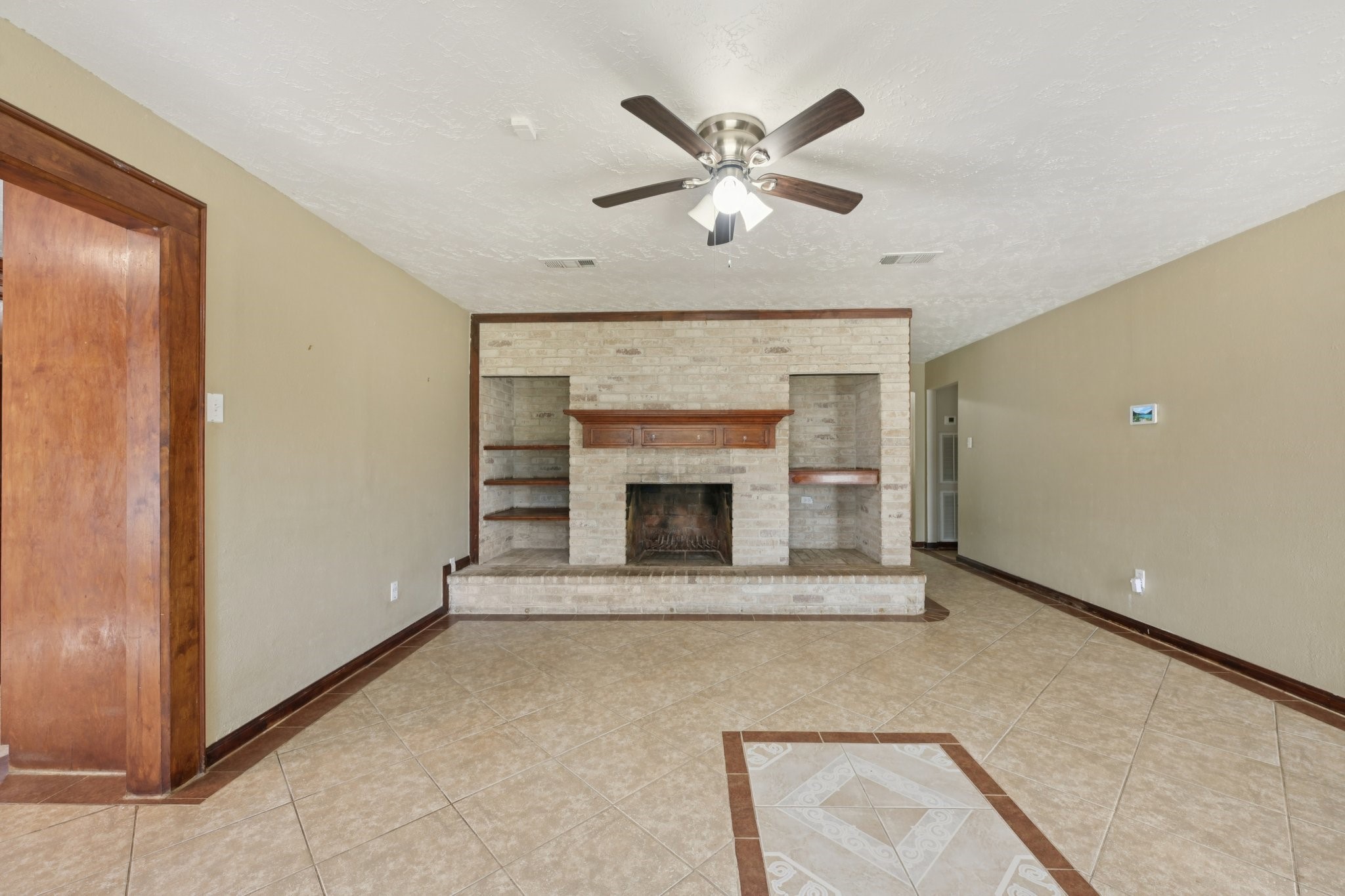 4310 Towergate Drive Spring, TX 77373 - Photo 8 of 46 a view of an empty room with a fireplace
