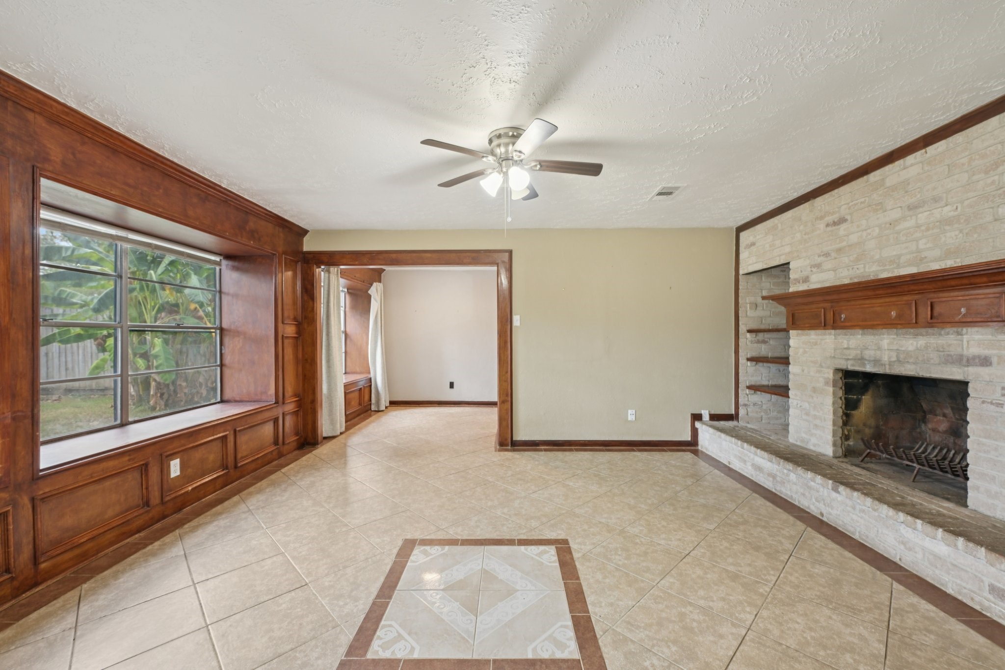 4310 Towergate Drive Spring, TX 77373 - Photo 10 of 46 a view of n empty room with window and fireplace