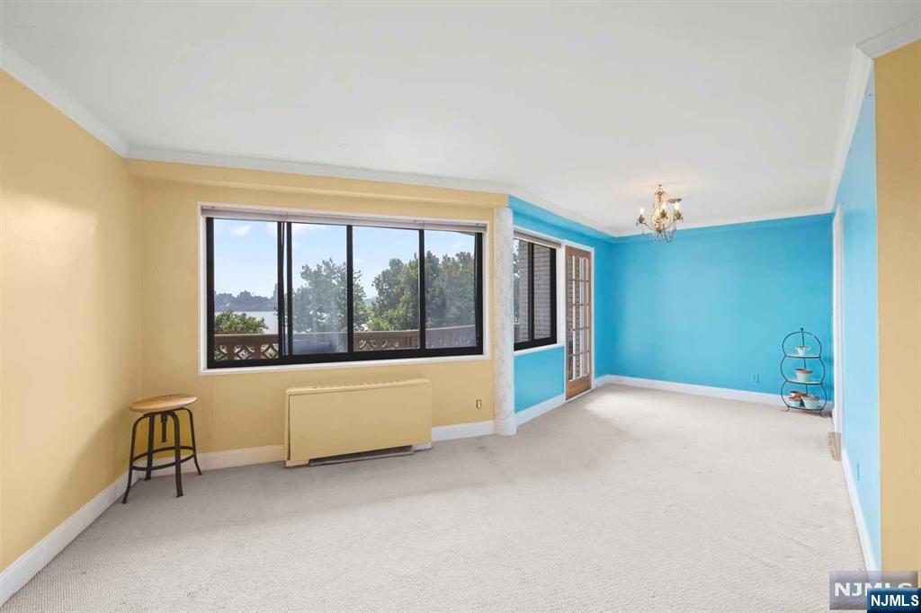 1375 River Road, Unit 4D Edgewater, NJ 07020 - Photo 11 of 25 a view of an empty room with a window