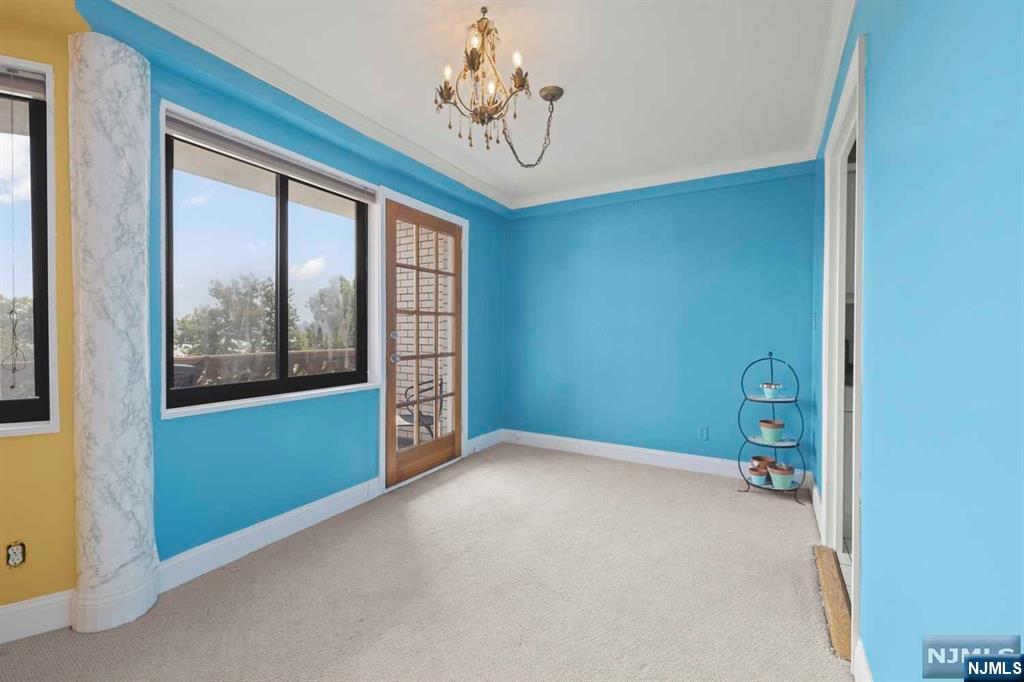 1375 River Road, Unit 4D Edgewater, NJ 07020 - Photo 13 of 25 a view of an empty room with a window