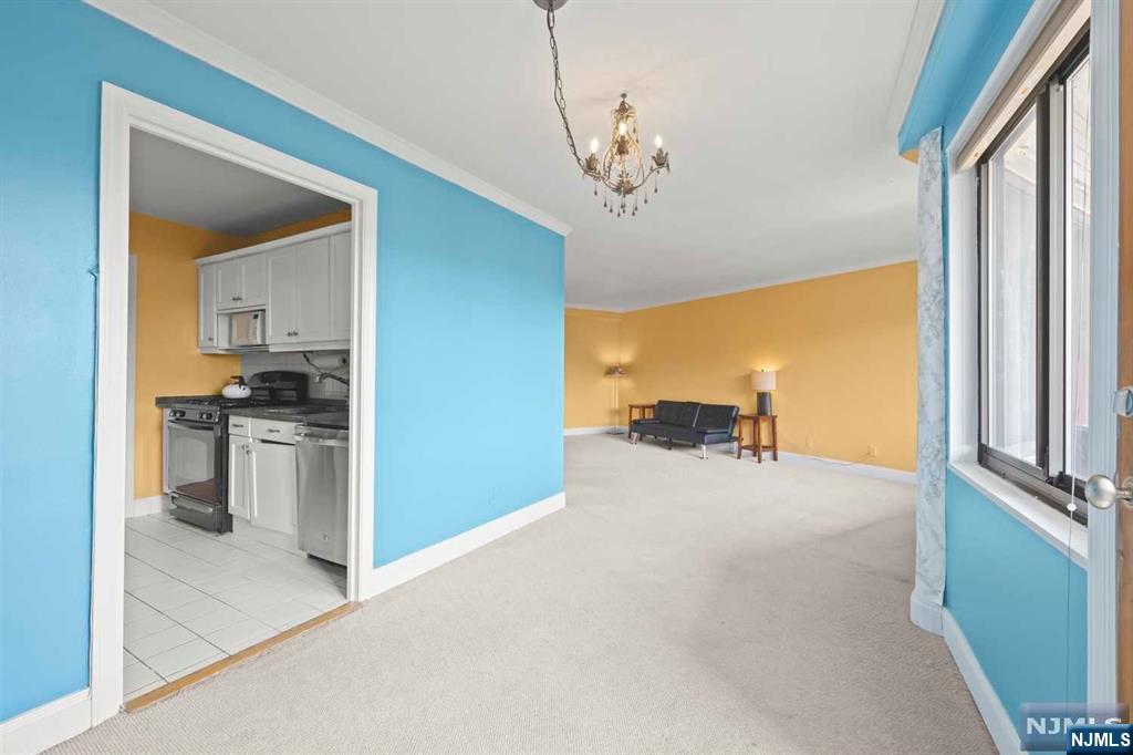 1375 River Road, Unit 4D Edgewater, NJ 07020 - Photo 14 of 25 a view of a kitchen with a sink and dishwasher kitchen view