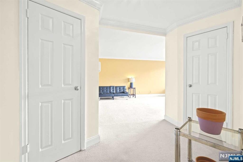 1375 River Road, Unit 4D Edgewater, NJ 07020 - Photo 5 of 25 a view of walk in closet with living room