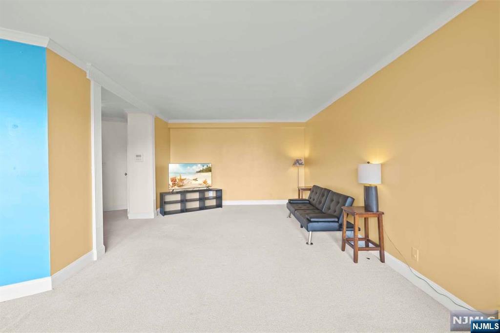 1375 River Road, Unit 4D Edgewater, NJ 07020 - Photo 8 of 25 a view of game room with furniture and lamp